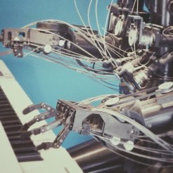 A robot playing piano, powered by a bespoke software solution